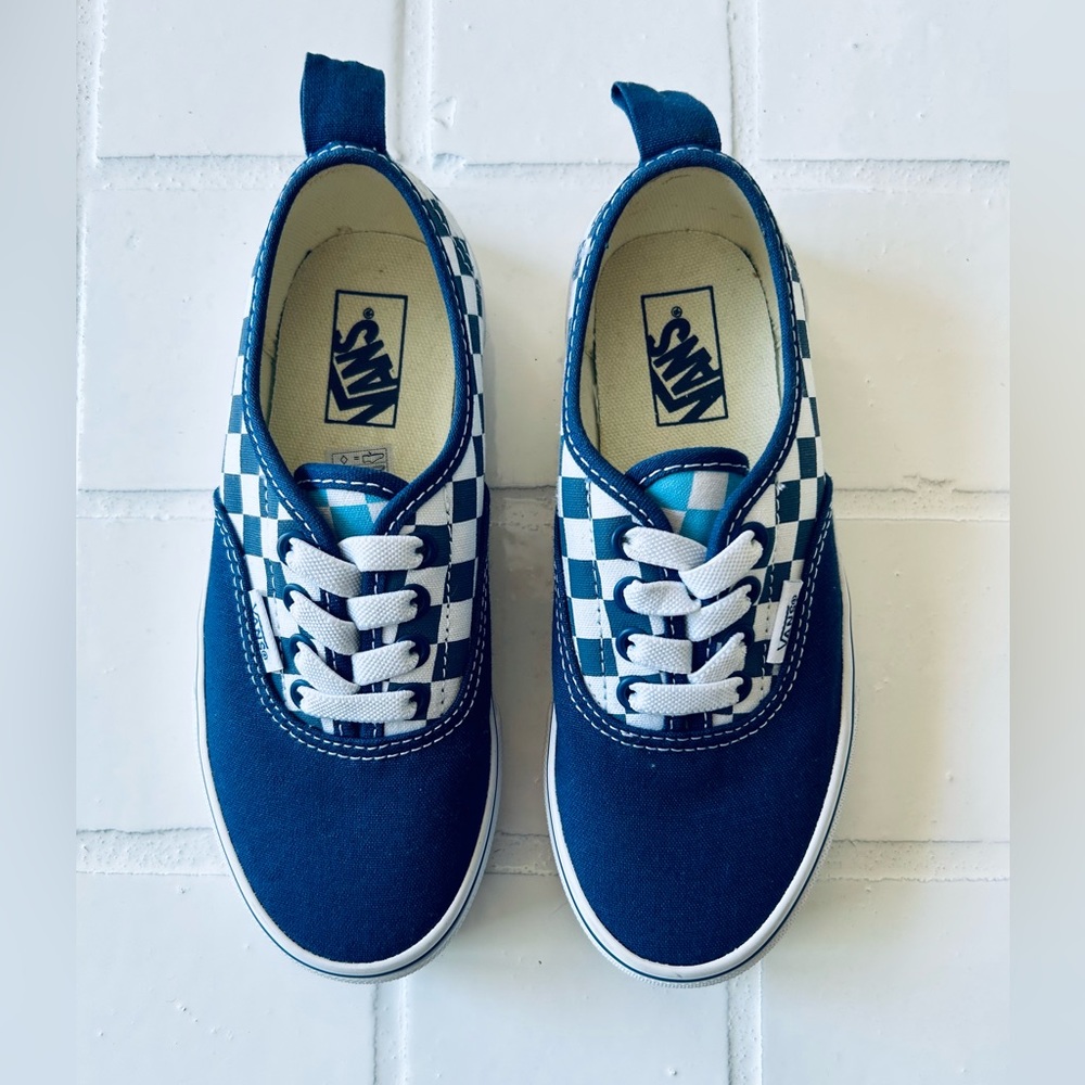 Kids blue checkered Vans.